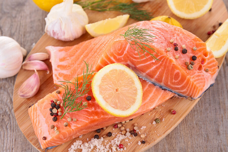 Raw salmon on platter