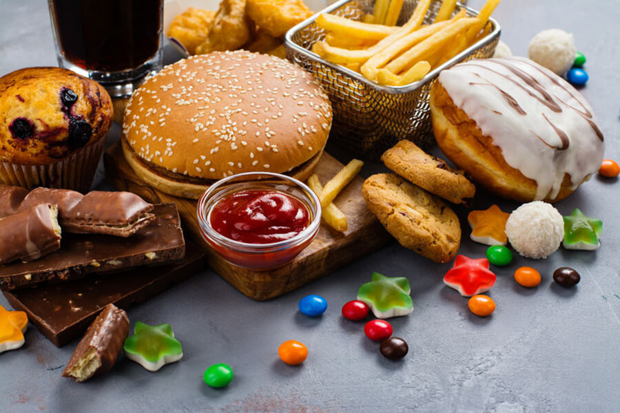 A variety of junk food on table