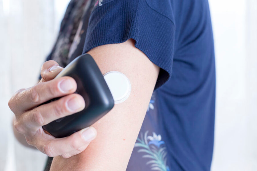 Diabetes device attached to arm