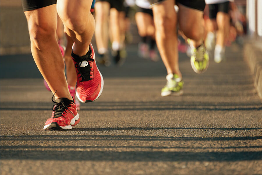 Runners running marathon