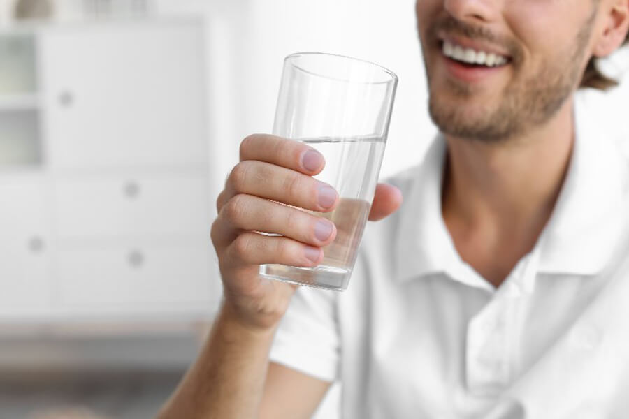 Male drinking water
